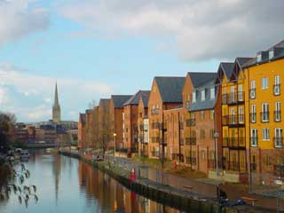 Riverside housing and river in Norwich